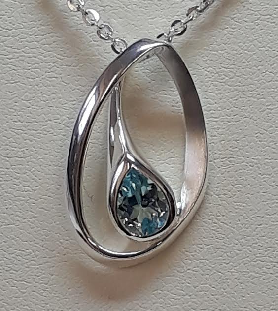 Silver and blue Topaz pendant
